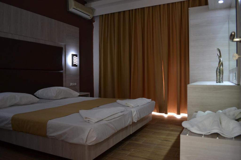 Karavos Hotel Apartments Архангелос Екстериор снимка